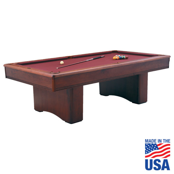 A pool table with red cloth and wooden legs.