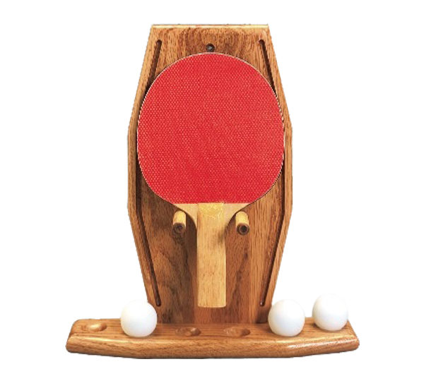 A wooden table tennis racket holder with two balls.