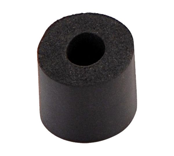 A black rubber bushing with a hole in it.