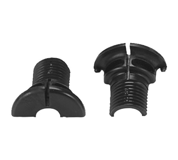 A pair of black plastic parts sitting next to each other.