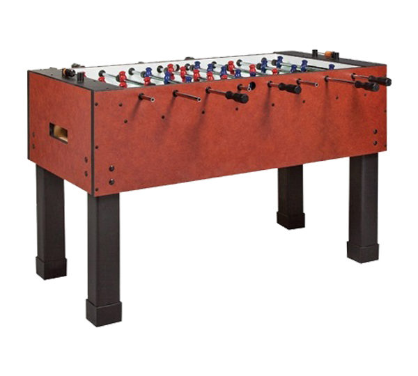 A foosball table with red and black legs.