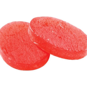 Two red round candies sitting next to each other.