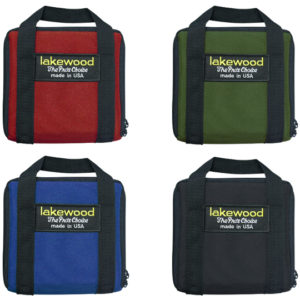 A group of four different colored bags with logos on them.