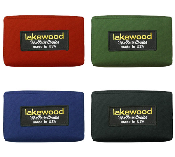 A group of four different colored wallets.