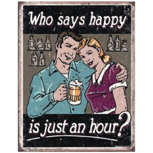 A man and woman holding beers in front of a sign.