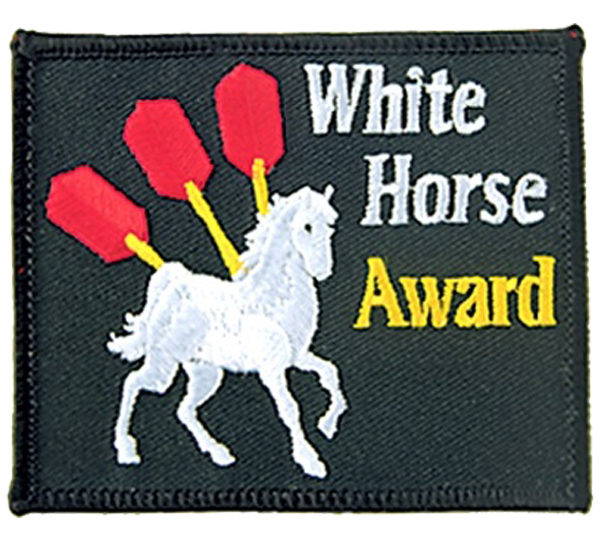 A patch that says white horse award with three red darts.