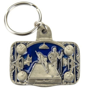 A key chain with a picture of jesus and the apostles.