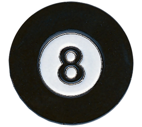 A black and white eight ball sitting on top of a table.