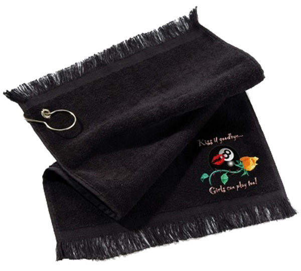 A black towel with a flower and key chain on it.